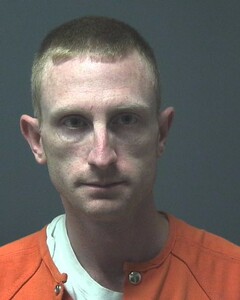 Mugshot of THOMAS, JAMES